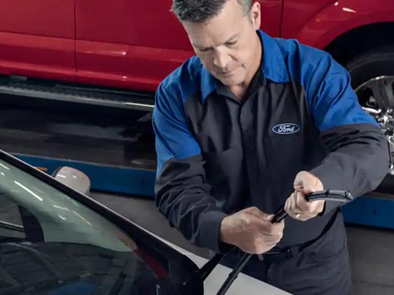 service tech working on wiper blade