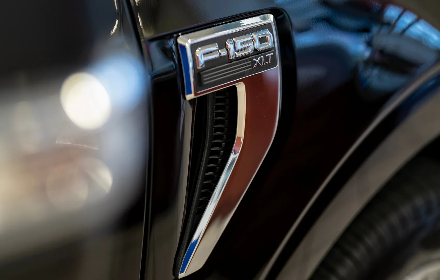 side of Ford F-150 truck at C. Harper Ford